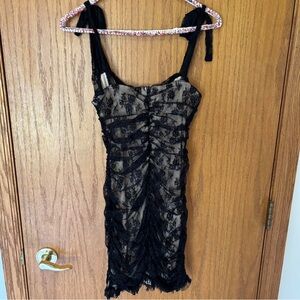 Lulu’s black and nude rutched floral lace formal dress